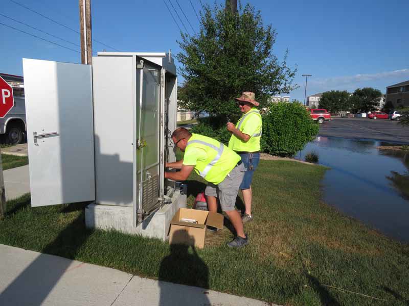 City workers Brandon Conroy, Tim Kotschwar